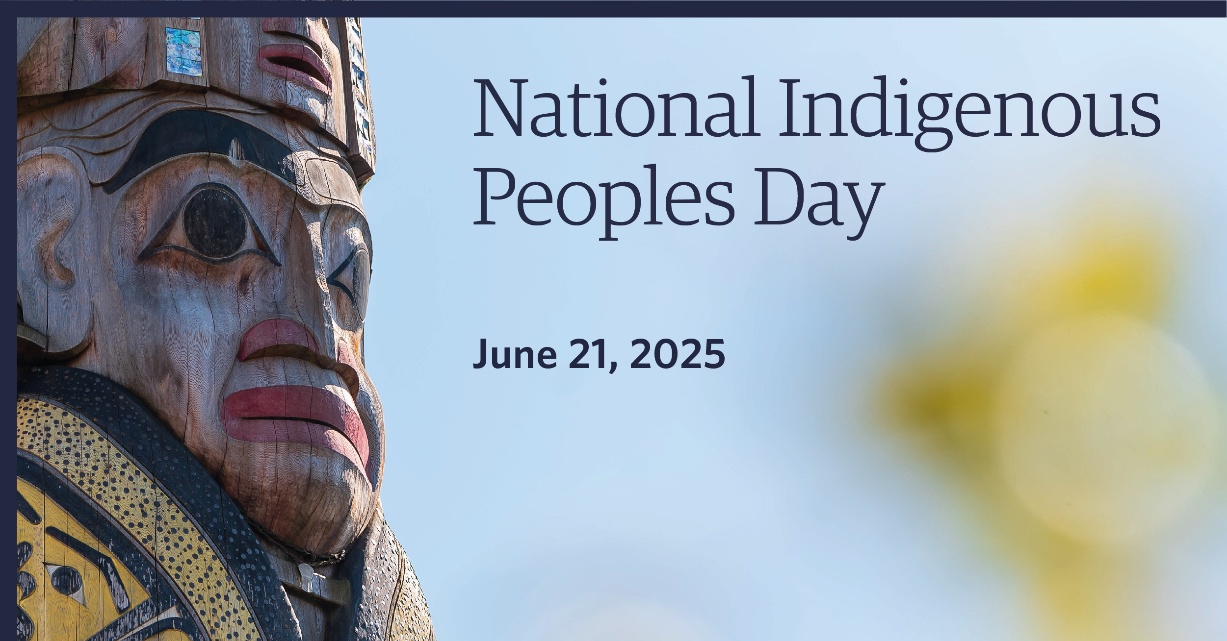 Close-up of a totem pole with intricate carvings and vibrant colors. Text beside the pole reads: 'National Indigenous Peoples Day' and 'June 21, 2025'