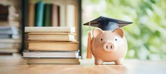 Piggy bank with mortarboard
