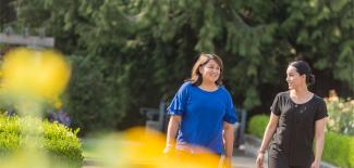 Staff walking in the Rose Garden