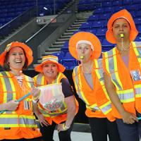 Four Sports Day participants wearing crossing-guard costumes